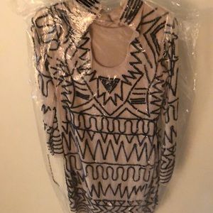 Beaded nude and black mini dress